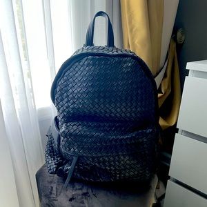 Woven black leather backpack
